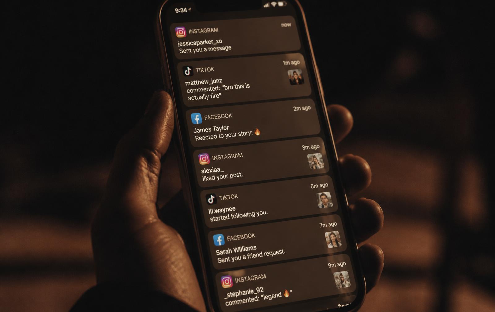 A phone screen filled with incoming Instagram, TikTok and Facebook messages